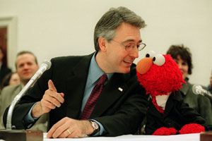 Non-monster Sesame Street colleague like Elmo spoke to Congress on Cookie Monster's behalf.